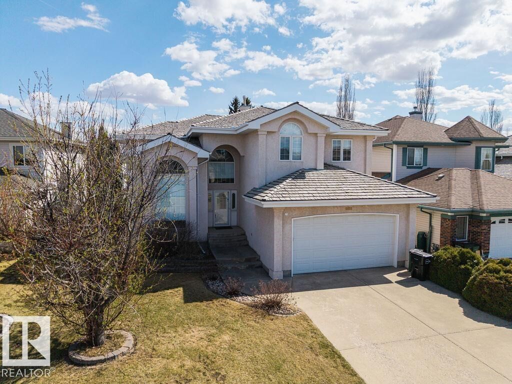 Property Photo: 11551 14 Avenue NW AB T6J 7B3