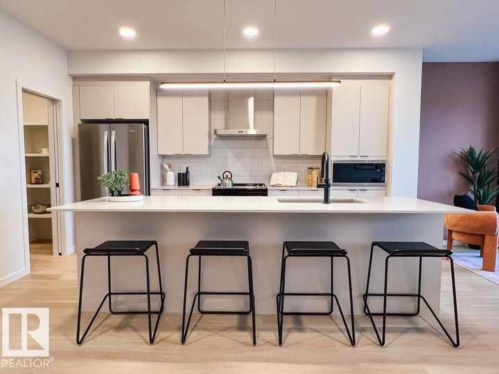 Property Photo: 1564 Keswick Drive SW AB T6W 5R8