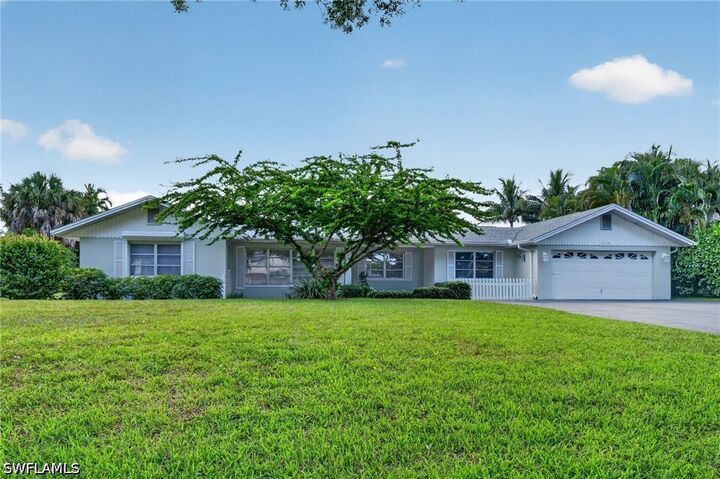 Property Photo:  1608 Crayton Road  FL 34102 