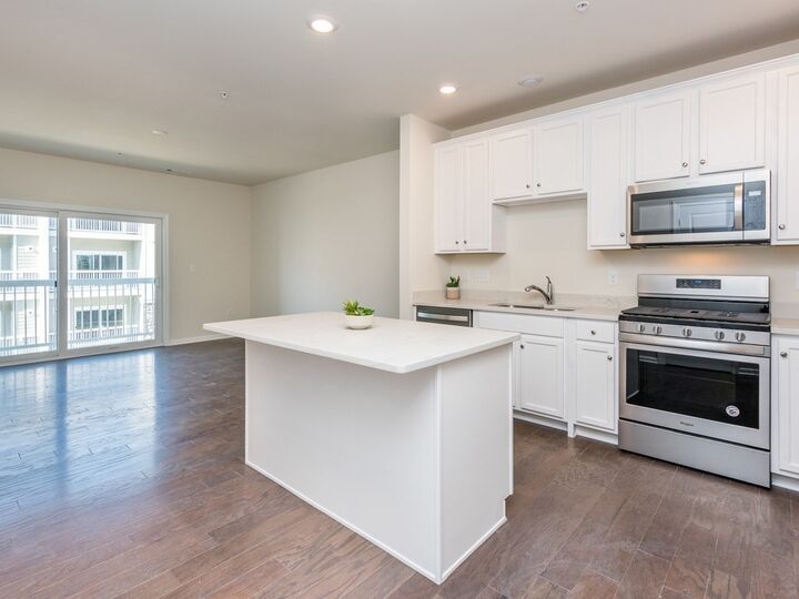 Property Photo:  130 University Ave 1303  MA 02090 
