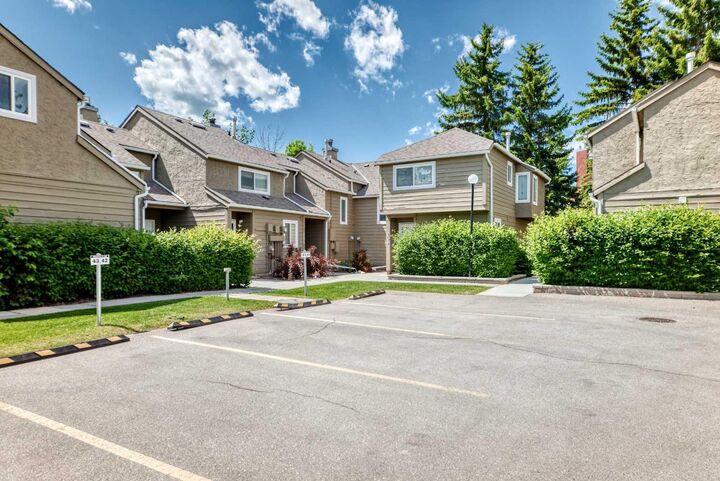 Property Photo: 829 Coach Bluff Crescent SW 205 AB T3H 1B1