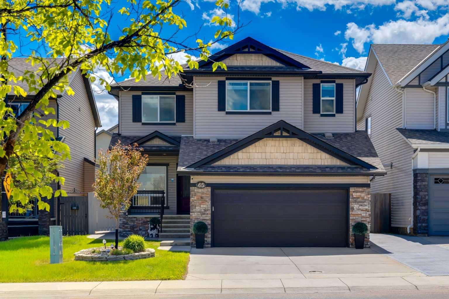 Property Photo:  65 Morningside Circle SW  AB T4B 0L7 