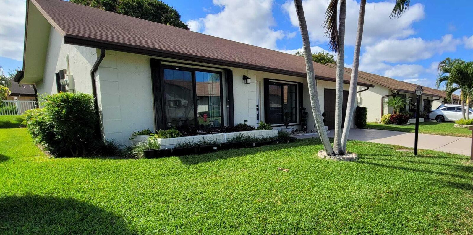 Property Photo:  6209 Olivewood Circle  FL 33463 