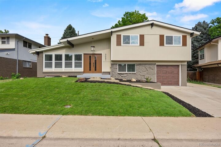 Property Photo:  3021 S Valentia Street  CO 80231 
