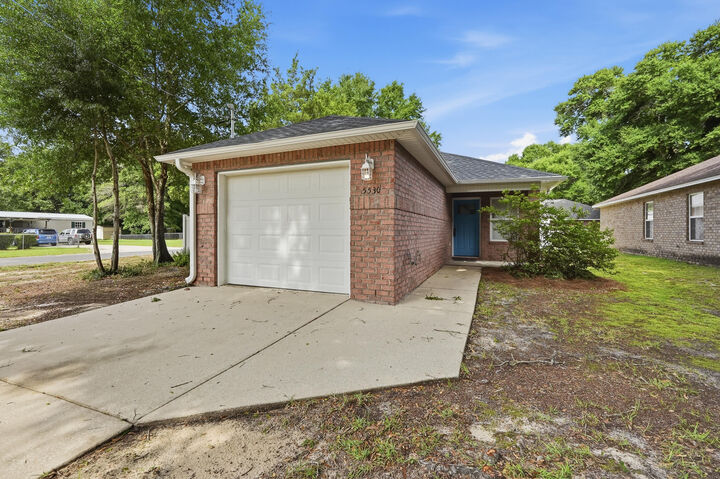 Property Photo:  5530 Royal Street  FL 32539 