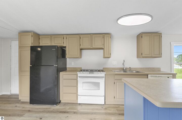 Property Photo:  202 Jenny Lind Street  MI 49688 