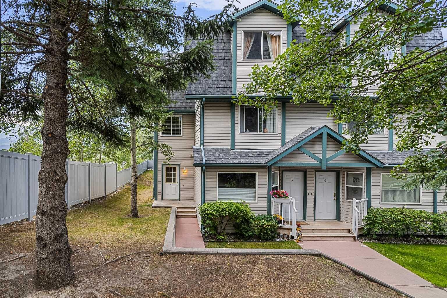 Property Photo: 200 Glacier Drive 9 AB T1W 1K6
