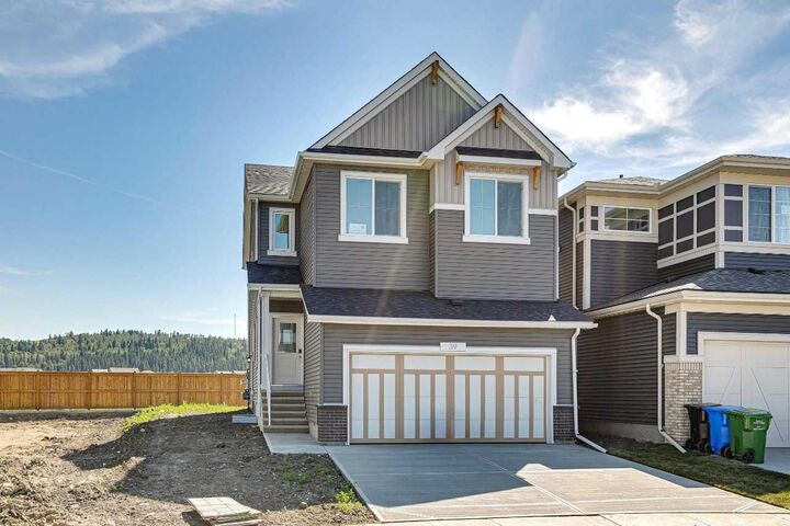 Property Photo: 39 Creekstone Green SW AB T2X 6H6