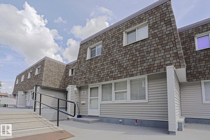603 Village On The Green Green NW — photo 1