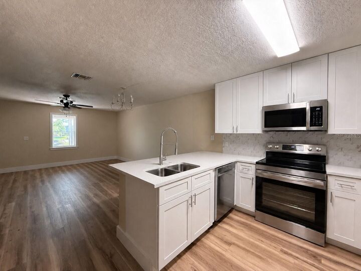 Property Photo:  12718 Somerset Oaks Street  FL 32828 