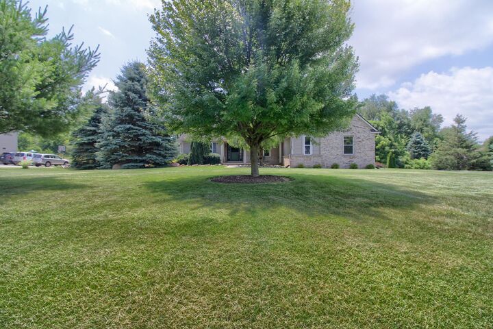 Property Photo:  6833 N Meadows Pass  MI 48130 