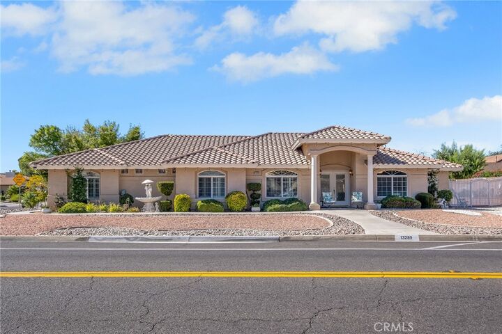Property Photo:  13289 Country Club  CA 92395 