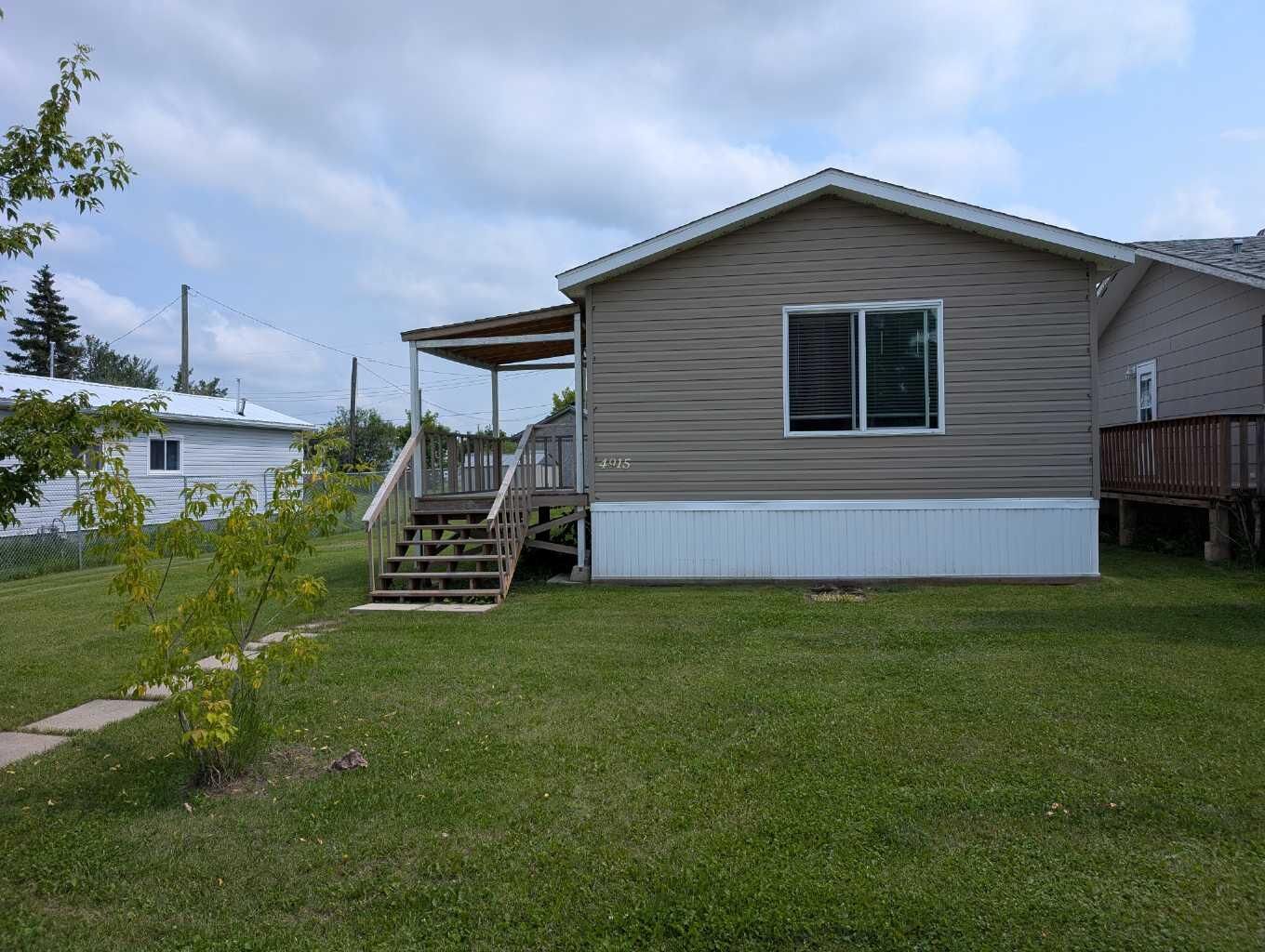 Property Photo: 4915 1 Street AB T0H 1G0
