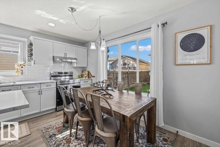 Property Photo:  9722 87 St  AB T8R 1V2 