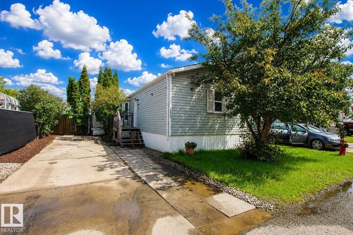 Property Photo: 1036 Lakeland Crescent AB T8H 1J2