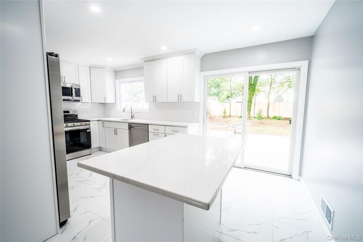 Property Photo:  11 Berry Lane  NY 11720 