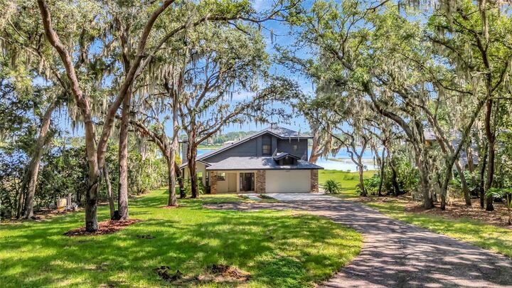 Property Photo: 10547 Lakeshore Drive FL 34711