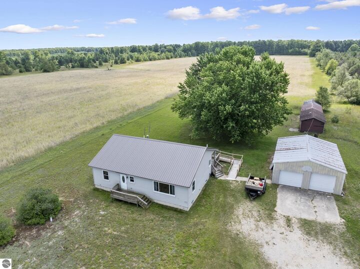 Property Photo:  6268 E M-72  MI 49646 
