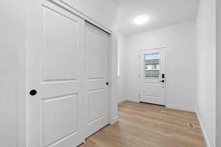 Property Photo:  302 Baneberry Way SW  AB T4B 5R9 