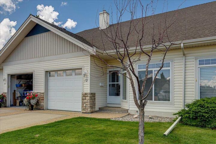 Property Photo: 939 Ramage Crescent 12 AB T4P 3Z9