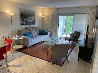 Property Photo:  201 178th Dr 304  FL 33160 
