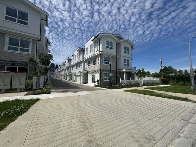 Property Photo: 8181 135A Street 31 BC V3W 3N8