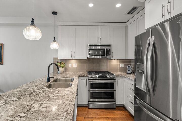 Property Photo: 5099 Springs Boulevard 313 BC V4M 0A2