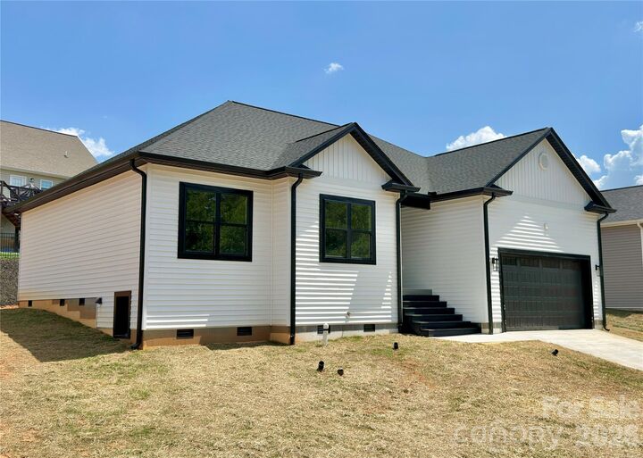 Property Photo:  1204 Spring Time Court SW  NC 28645 