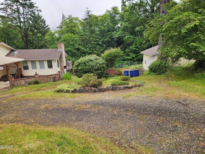 Property Photo:  2020 NE Surf Avenue  OR 97367 