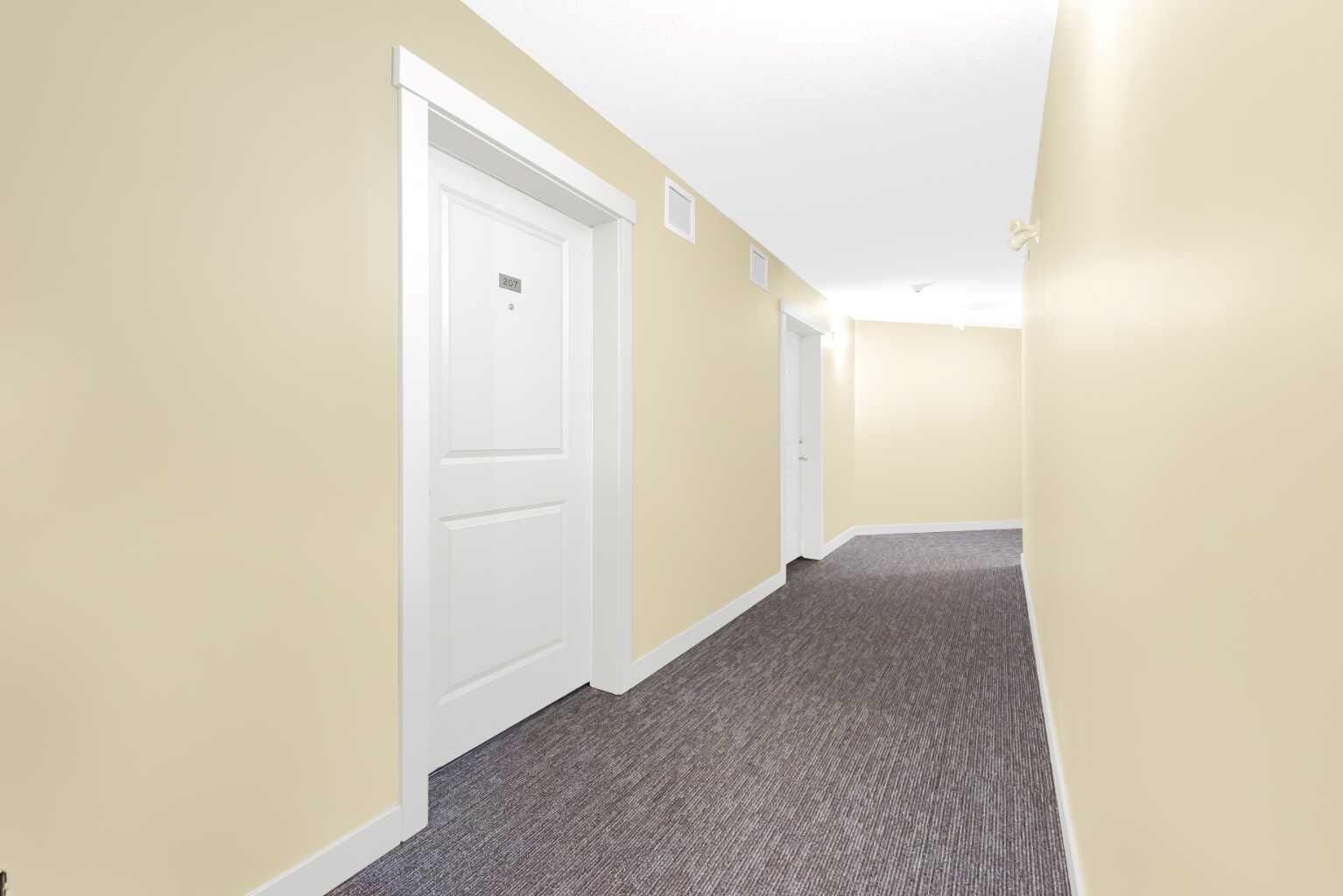 Property Photo: 5 Saddlestone Way NE 207 AB T3J 0S2