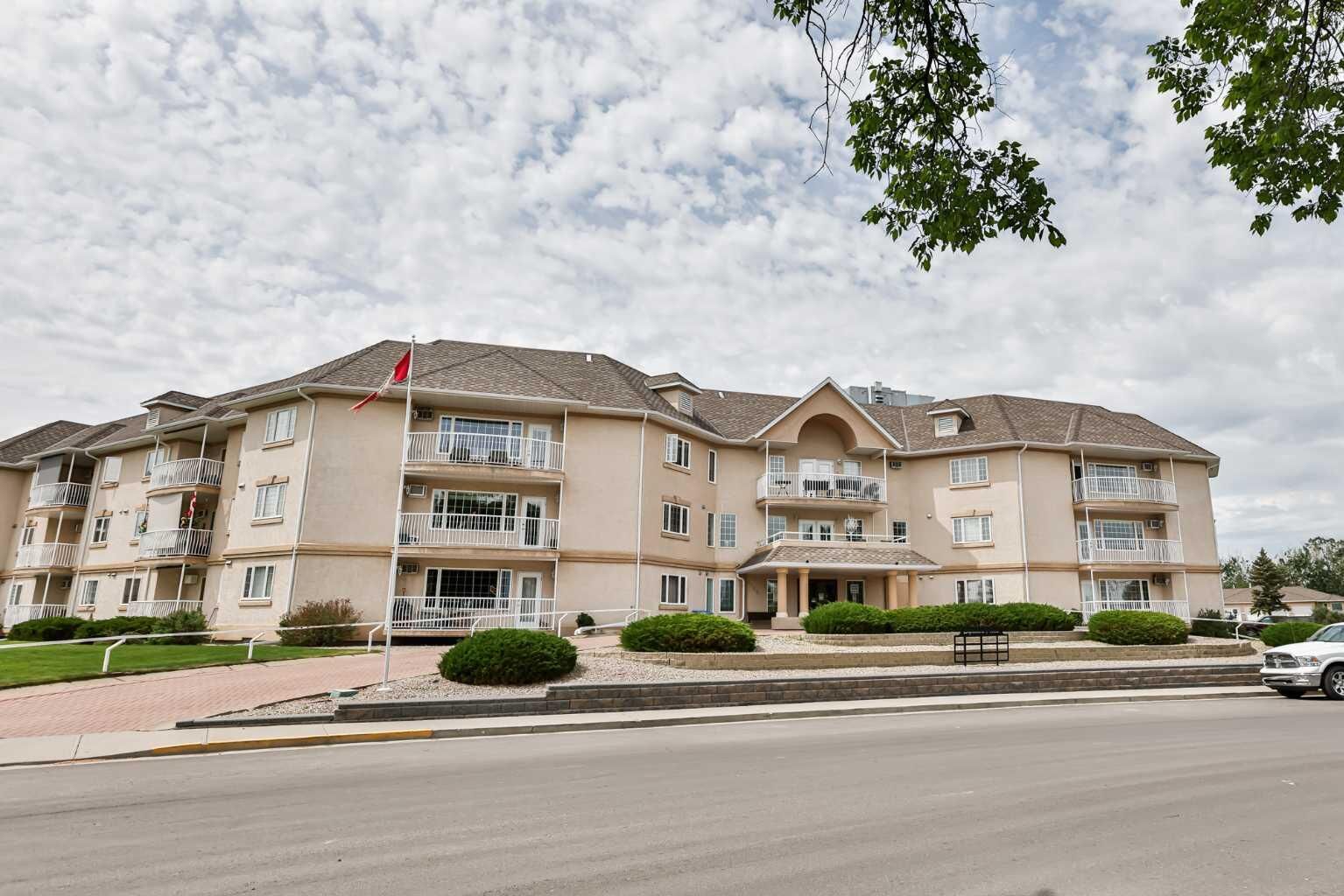 Property Photo:  4800A 48 Avenue 210  AB T1G 2G9 