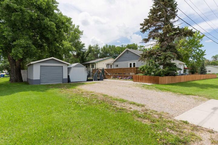 Property Photo:  5123 56 Street  AB T1G 1M8 