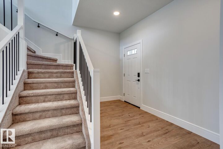 Property Photo: 13 Scoria Wynd AB T8L 0Z1
