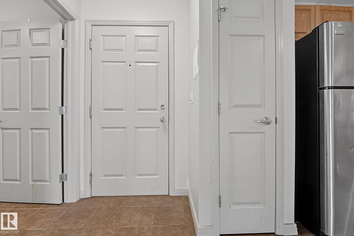 Property Photo:  5005 165 Avenue NW 111  AB T5Y 0L8 