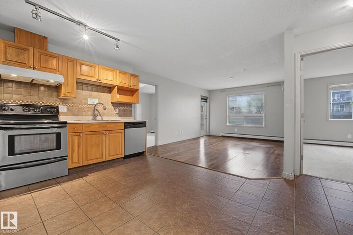Property Photo: 5005 165 Avenue NW 111 AB T5Y 0L8