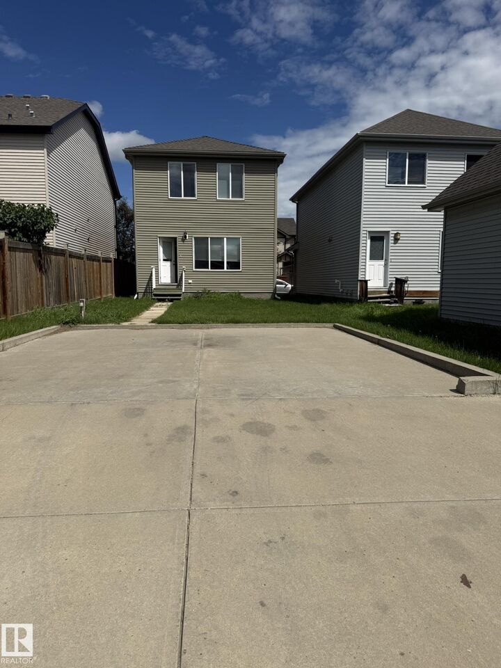 Property Photo:  8305 Ellis Crescent NW  AB T6M 2N5 