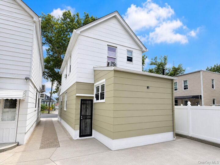 Property Photo: 10713 Sutter Avenue NY 11417