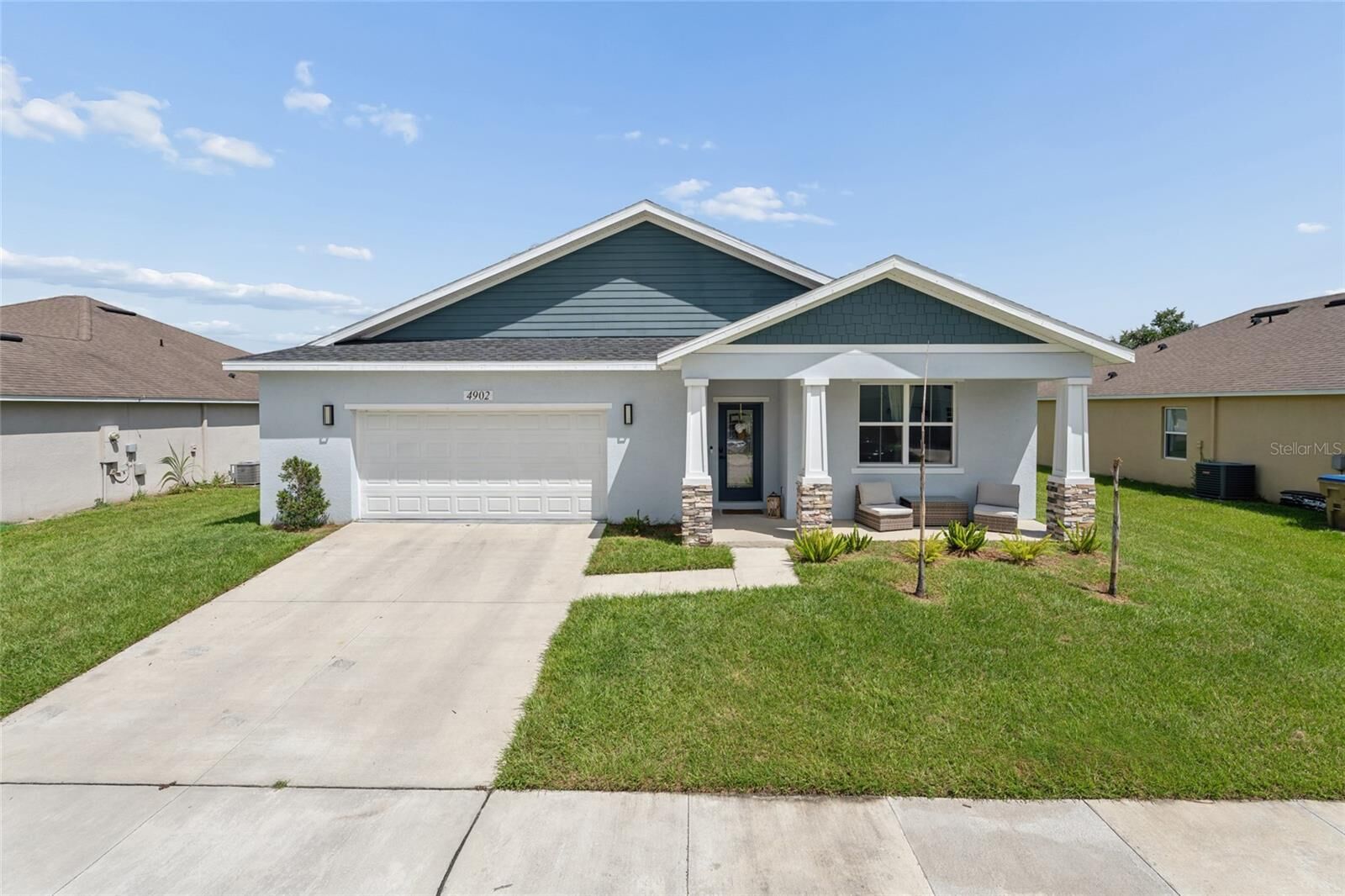 Property Photo: 4902 Pall Mall Street E FL 34758