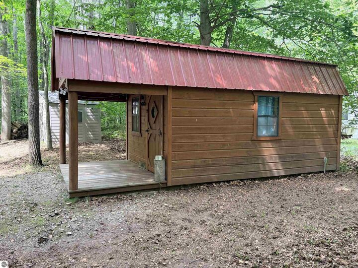 Property Photo:  113 Hills Circle  MI 49655 