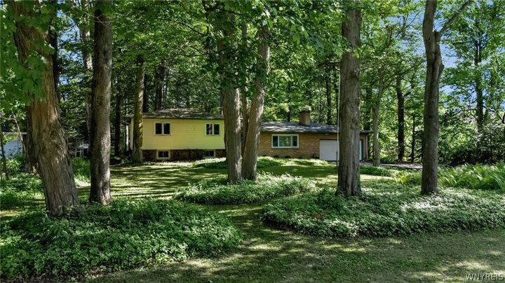 Property Photo:  303 Hilltop Drive  NY 14059 