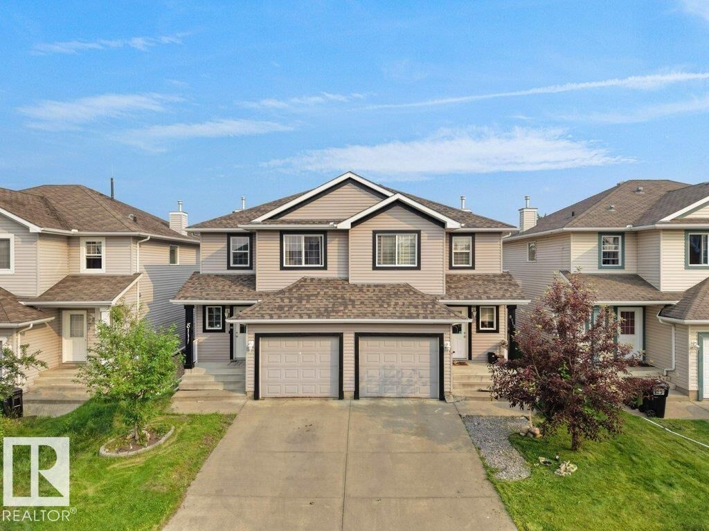 Property Photo:  8111 7 Avenue SW  AB T6X 1L9 