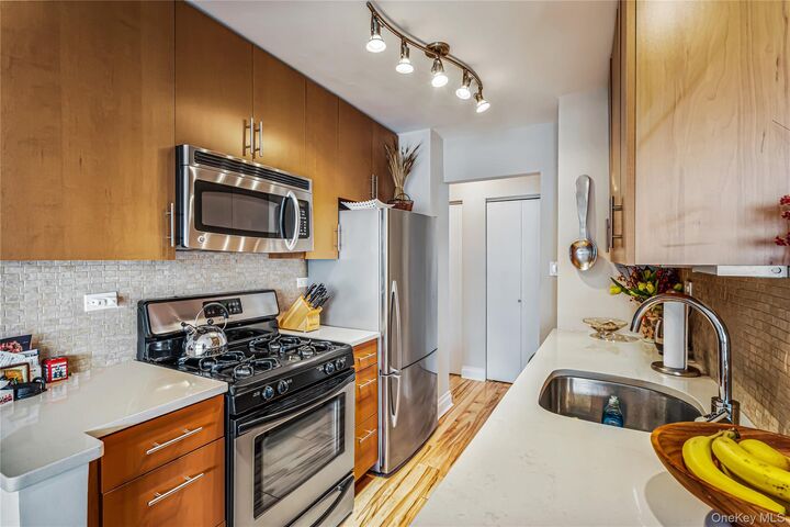 Property Photo: 18-15 215 Street 14 G NY 11360