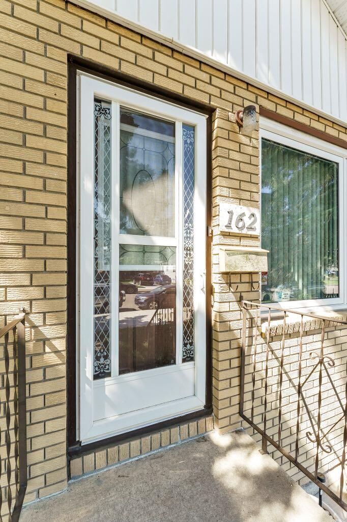 Property Photo:  162 2 Street NE  AB T1A 5K9 