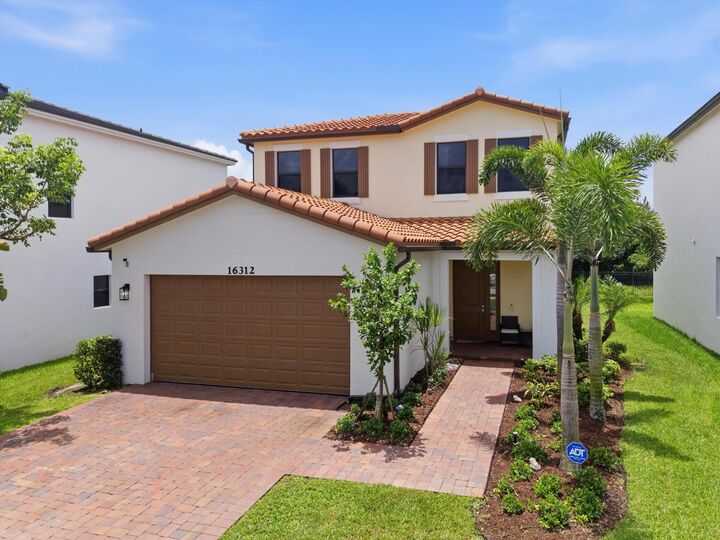 Property Photo: 16312 Sandy Shore Drive FL 33470