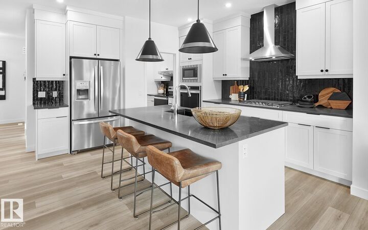 Property Photo: 6053 Edmonds Place NW AB T6M 1J7