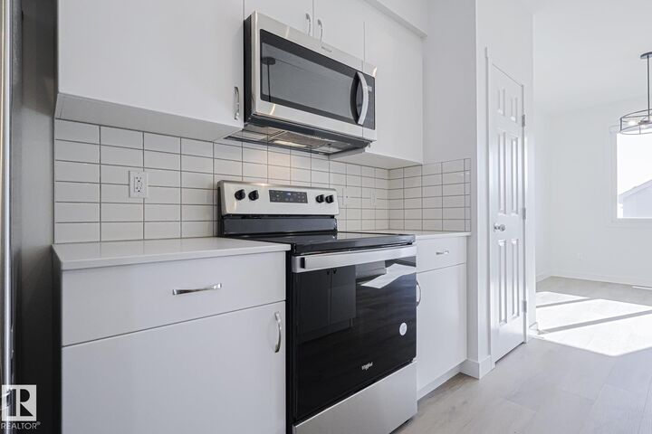 Property Photo: 6343 King Wynd SW AB T6W 5P1