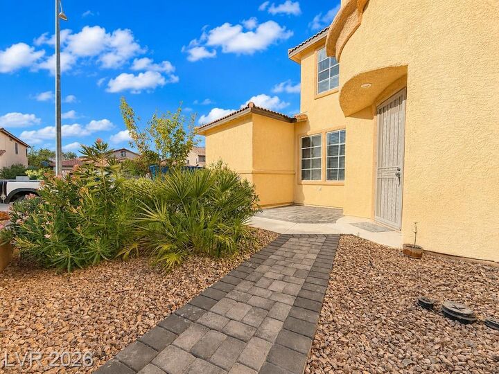 Property Photo: 7681 West Mesa Verde Lane NV 89113