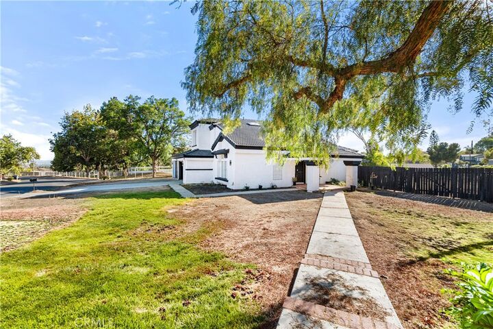 Property Photo:  11901 Vista De Cerros  CA 92555 