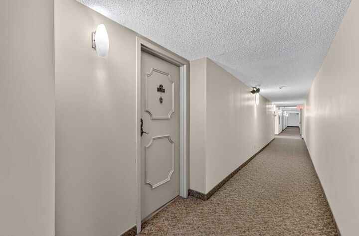 Property Photo:  2425 90 Avenue SW 118  AB T2V 4X8 