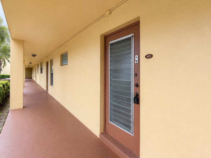 Property Photo:  5901 NW 61st Avenue 105  FL 33319 